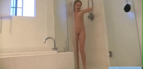  Cutie teen amateur Scarlett singing while taking a shower
